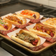 Image for article titled The hot dogs of Molokai: On living in paradise with a stolen grill
